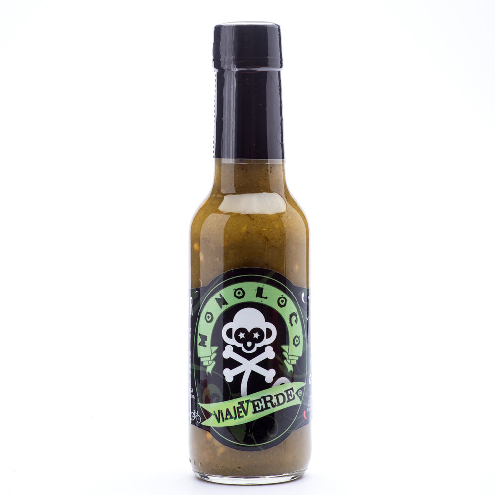 Bottle of MONOLOCO Viaje Verde Hot Sauce, featuring medium heat and herb-infused flavors, 150ml.